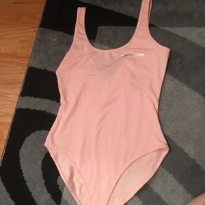 NWT peach bodysuit